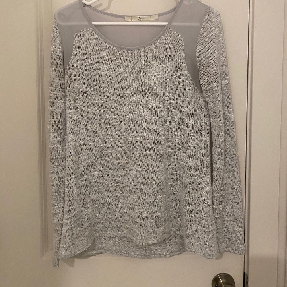 Sheer at the shoulders sweater material everywhere else